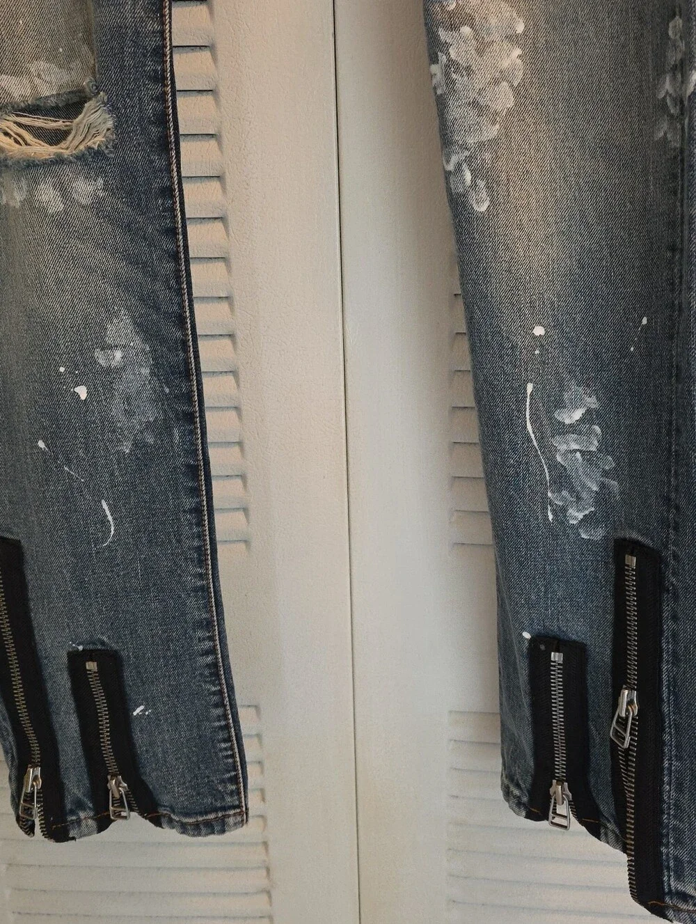 Cult of Individuality Distressed Skinny Jeans in Faded Blue with Zipper Cuffs